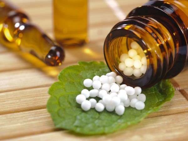 alternative medicine with homeopathy and herbal pills